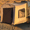 The Toy Hauler Patio Ramp Tent by PahaQue Custom for Intech Discover Trailers delivers weatherproof comfort and protection, making your adventures worry-free wherever you go.