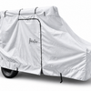 A white Boreas Campers Trailer Cover Premium Protection from Elements by Paha Que Custom is secured with straps and a side zipper over a small travel trailer with exposed tires and front propane tank, offering all-weather protection.