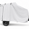 The Campinawe Trailer Cover by Paha Que Custom features heavy-duty MagnaTuff fabric that is weatherproof and breathable, shielding your small trailer while allowing access to the wheel, hitch, and front-mounted propane tank.