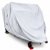 A Teton X travel trailer is fully enclosed in the Paha Que Custom Teton X Trailer Cover Premium Protection, concealing its features for superior weather protection, with only the wheels and hitch partially visible on a plain white background.