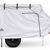 The PahaQue Wilderness Zion Off Road Trailer Cover, made from heavy-duty MagnaTuff fabric, features black straps, a zipper, and the PahaQue logo. It offers custom-fit weather protection for your trailer while partially revealing its tire and hitch.