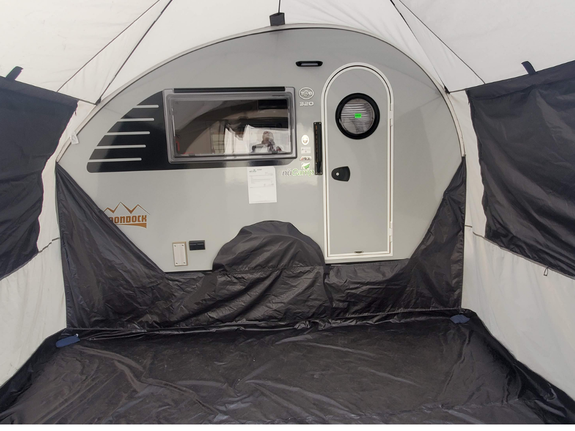 Enjoy a camping upgrade with the Paha Que Custom NuCamp TAB 320 Trailer Side Tent for TAB and Boondock Trailers—shown here attached to a gray teardrop camper with round door, window, and mountain graphics.