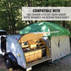 A small teardrop camper with its side hatch open shows a compact outdoor kitchen. Next to it is a Paha Que Custom 10x10 Side Mount Screen Room Tent by PahaQue for Camping and Outdoor Adventures, compatible with select trailer models.