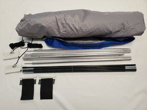 A disassembled Paha Que Custom R Pod Trailer Visor kit on a white surface, showing rolled fabric, metal poles, straps, and cords—perfect for anyone seeking premium R Pod accessories.
