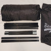 Paha Que Custom 5x7 Trailer Side Tent Screen Room kit shown on a white surface with two black carry bags, folded tent fabric, instructions, stakes, and tent poles—perfect for camping or as a trailer side tent. PahaQue Wilderness logo visible.