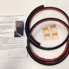 The Paha Que Custom Mounting Kit for Trailer Side Tents 10x10 and 5x7 includes three black and red rubber strips, four alcohol prep pads, and an instruction sheet for secure installation, displayed on a white surface.