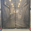 The Paha Que Custom Toy Hauler Mesh Door/Solid Room Divider covers your trailer or RV garage opening, offering a clear view inside with cabinets, lights, and counters while ensuring superior insect protection.
