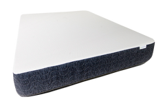 The PahaQue Wilderness Utopia Mattress features a white, textured memory foam top and dark gray, patterned sides for premium support, displayed on a white background.