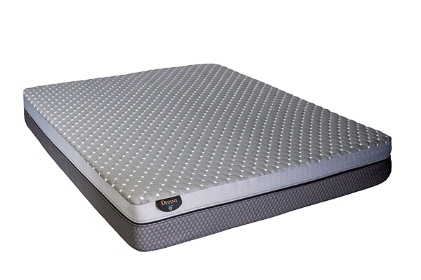 The Divini Mattress by PahaQue Wilderness is a gray customizable mattress with a quilted, textured surface and a dark diamond-patterned side panel, shown on a white background.
