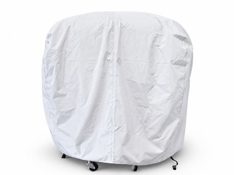 The Paha Que Custom Happier Camper HC1 Cover, in large white custom fit, drapes over a rounded trailer with small caster wheels at the base for weather protection, shown against a plain white background.