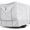 A large vehicle, likely an RV or trailer, is fully enclosed in a Paha Que Custom Hiker Trailer Covers Custom Fit Outdoor Protection. Black zippers and seams are visible, with part of a black tire peeking out from beneath the cover.