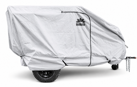 The Paha Que Custom Off Grid Trailer Covers offer premium protection for most OffGrid trailers, shielding your small two-wheeled trailer from the elements, while allowing hitch and chains to extend from the right side.