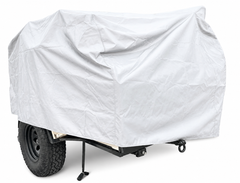 The Vintage Trailer Works XTR Cover by PahaQue Wilderness in light gray offers heavy-duty, full weather protection for your utility trailer with large tires, concealing it completely as it sits on a white surface with one support leg extended.