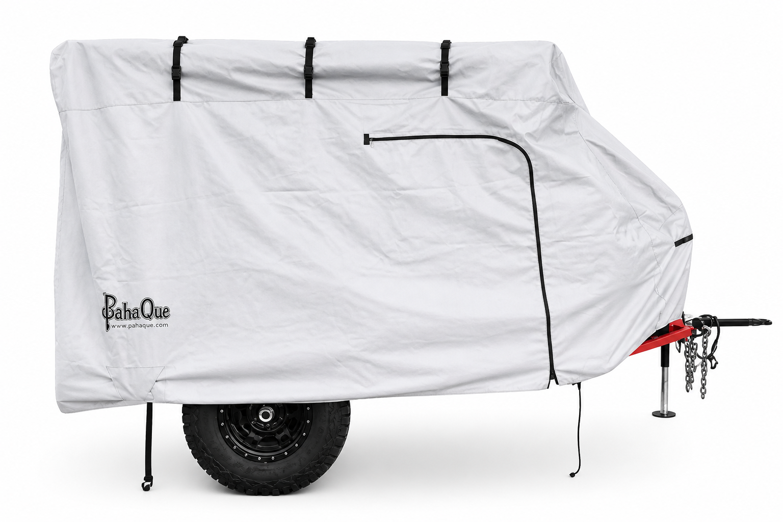 The PahaQue Wilderness Zion Off Road Trailer Cover, made from heavy-duty MagnaTuff fabric, features black straps, a zipper, and the PahaQue logo. It offers custom-fit weather protection for your trailer while partially revealing its tire and hitch.