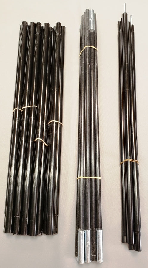 Three bundles of dark metal poles with rounded ends, part of the Paha Que Custom 5x7 Side Tent Complete Pole Set for the SR57N-A Screenroom Tent, are held with elastic bands; some feature silver tips or connectors and are arranged vertically on a light surface.
